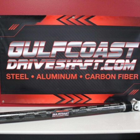 Carbon fiber driveshaft for 2018+ Ford Mustang GT, featuring a sleek black design with silver accents and solid cross U-joints.